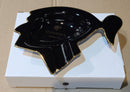 A black and gold Cohiba single cigar ashtray with a sculptural design, placed on a white box.