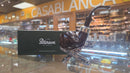 Peterson pipe with packaging on a counter in a store with 'Casablanca' branding.

