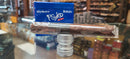 Psyko 7 - Nicaraguan Robusto cigar on display with a blue box in back