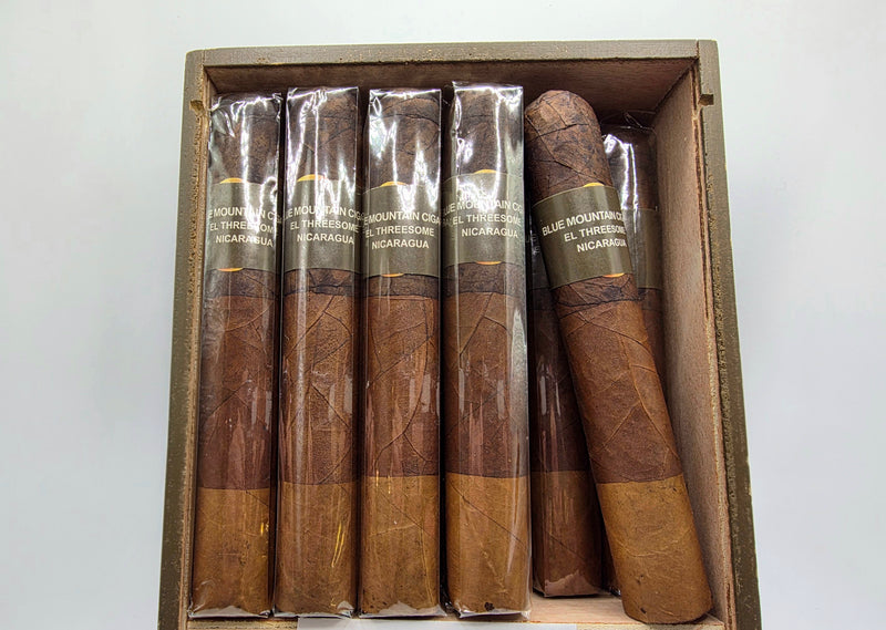 Box of cigars with visible branding on a white background - The Roller Ash - Blue Mountain Cigars - El Threesome -2