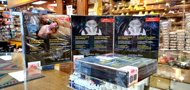 Packaging of Cohiba Mini Cigarillos with visible branding and images of the product