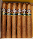 A box of Montecristo Open Eagle cigars displayed vertically with bands on each.